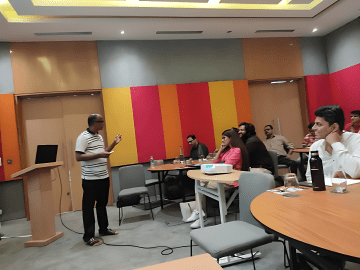Melvin Joseph addressing participants at VAXEL 2025 Aspiring RIA Conference